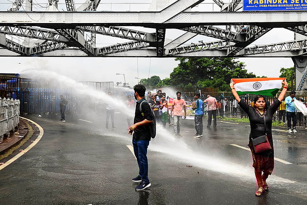 | Photo: PTI : Kolkata Rape-Murder Case: Police use water cannons to disperse students